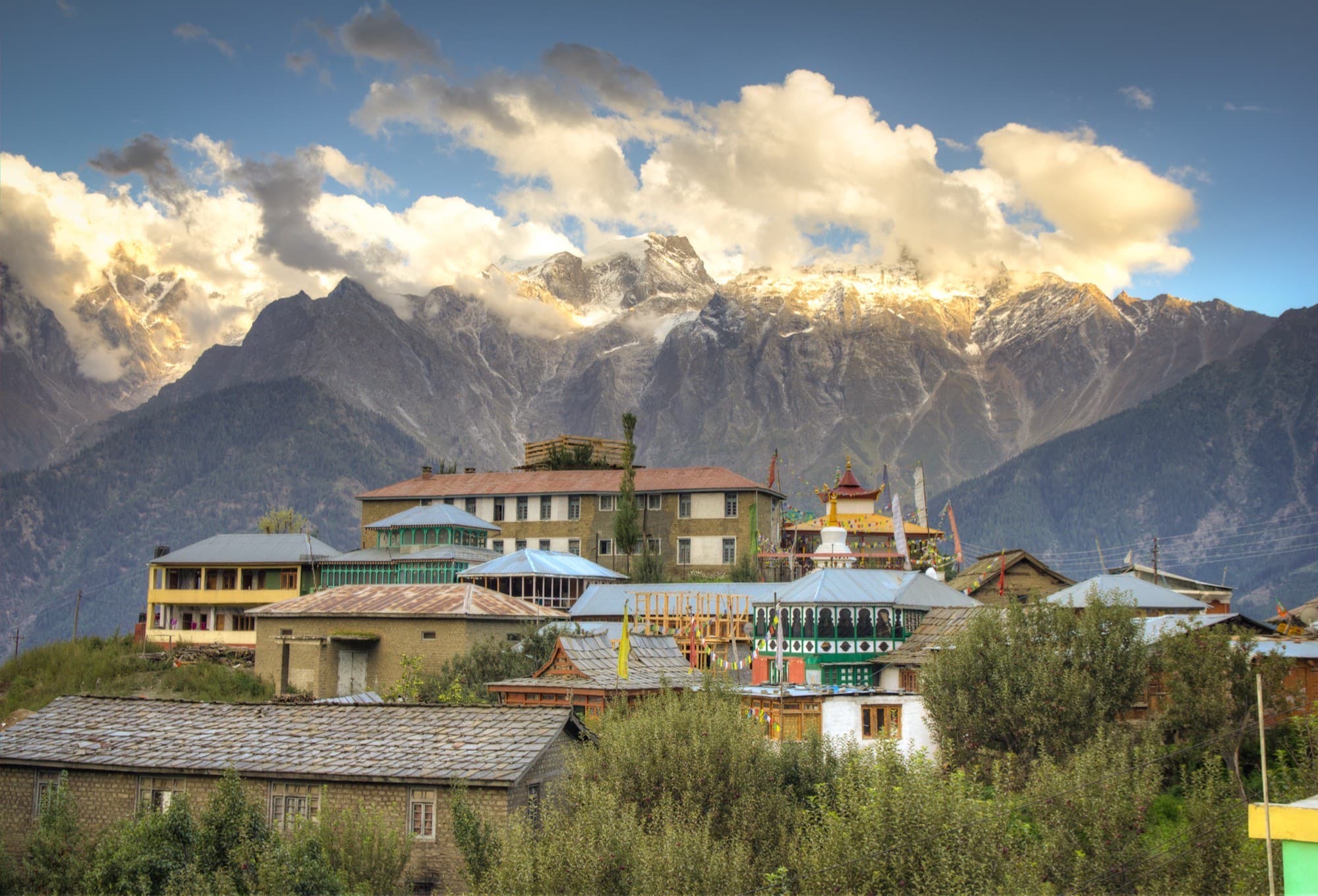 Snow mountains above a Kinnaur village