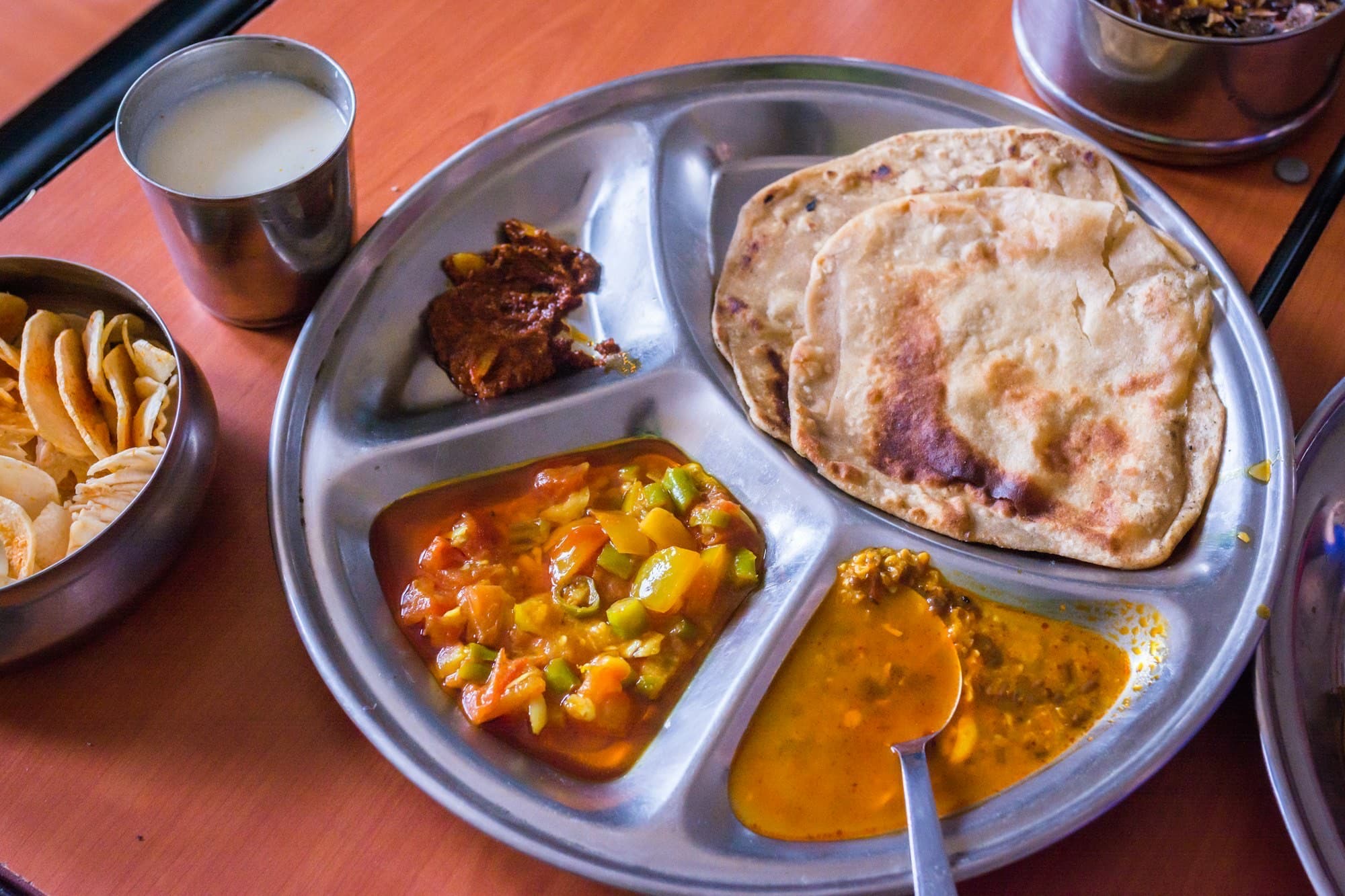 Mountain breakfast plate with paratha and butter