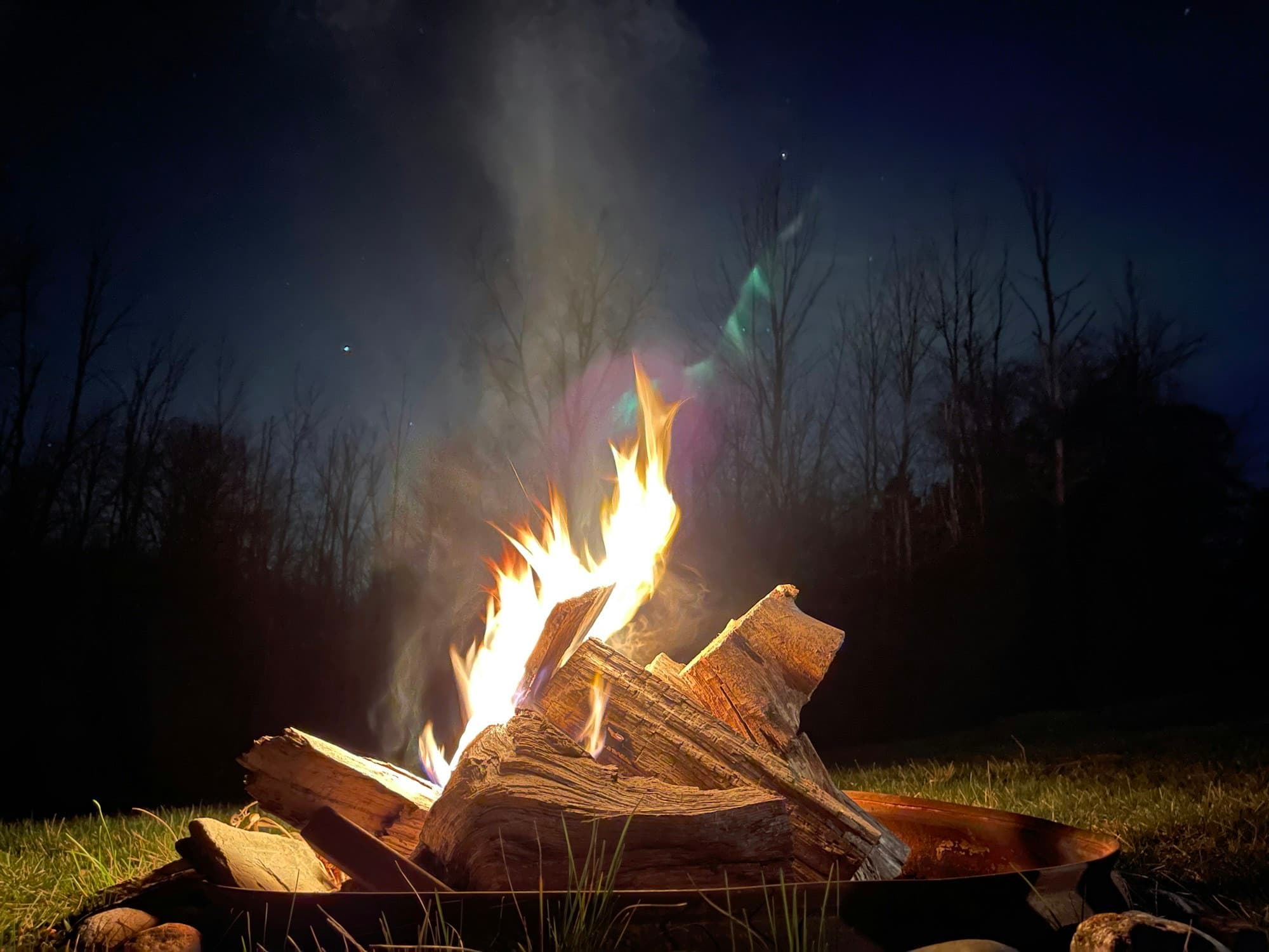 Bonfire under a starry sky